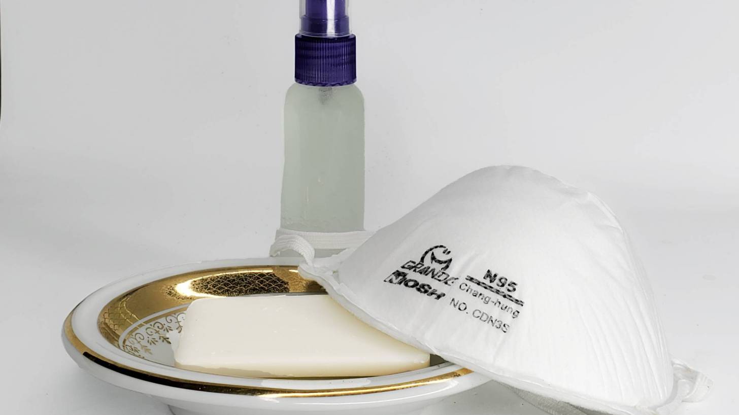 n95 surgical mask by soap and a hand sanitizer