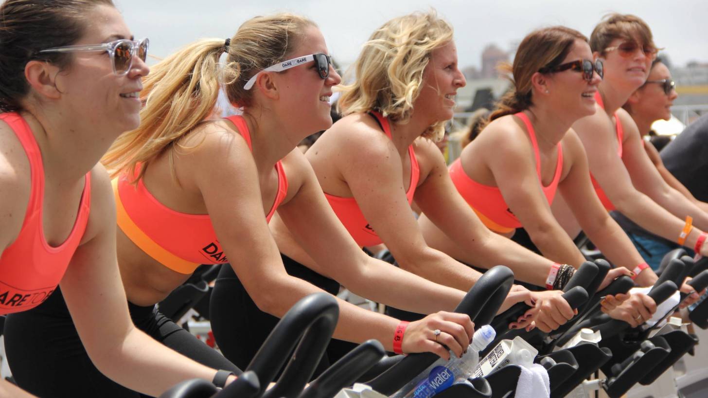 women riding bikes together